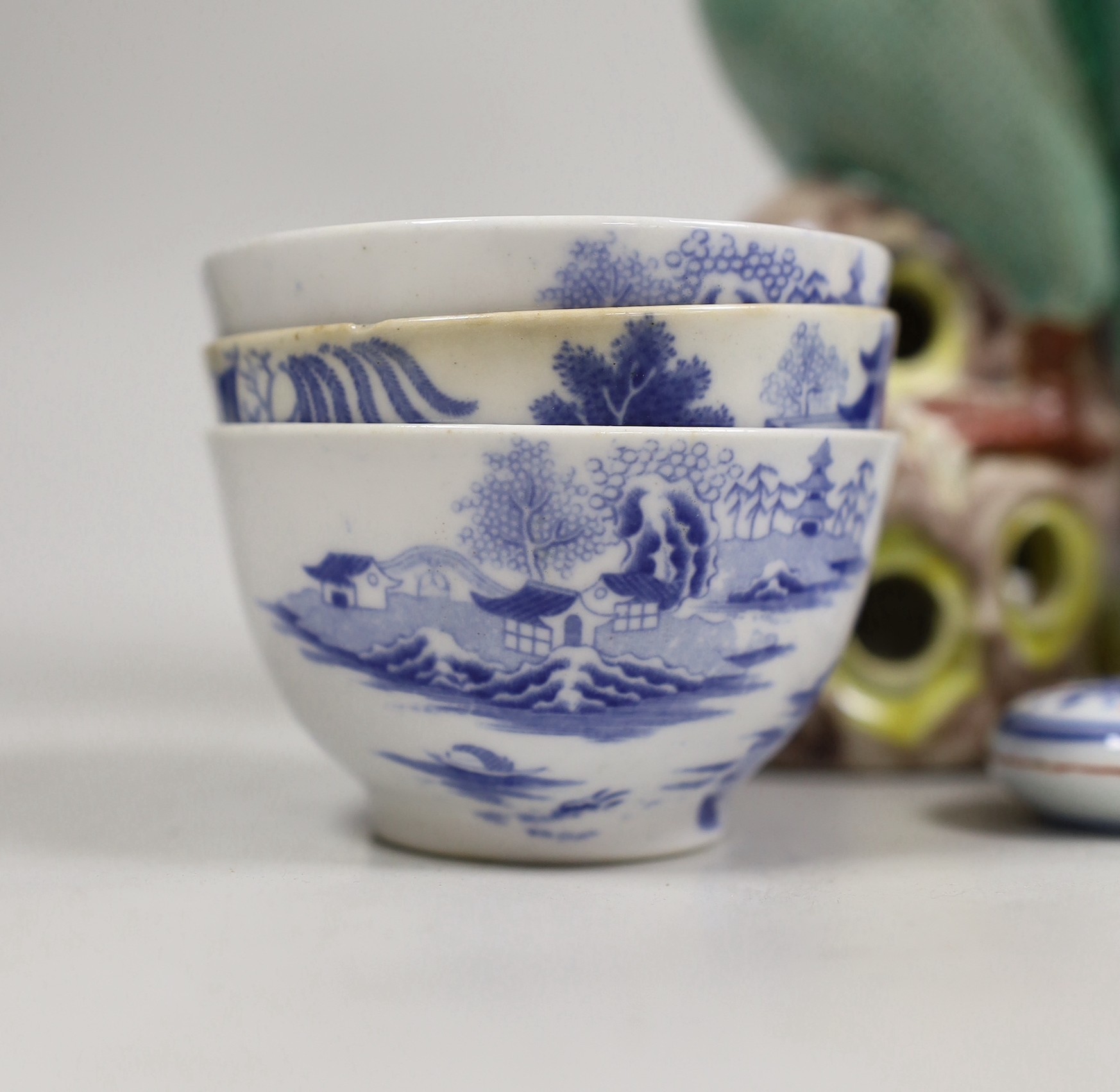 A group of Chinese hardstone carvings, a cloisonné enamel bowl, famille rose dishes and four blue and white bowls and model bird. Tallest 23cm
